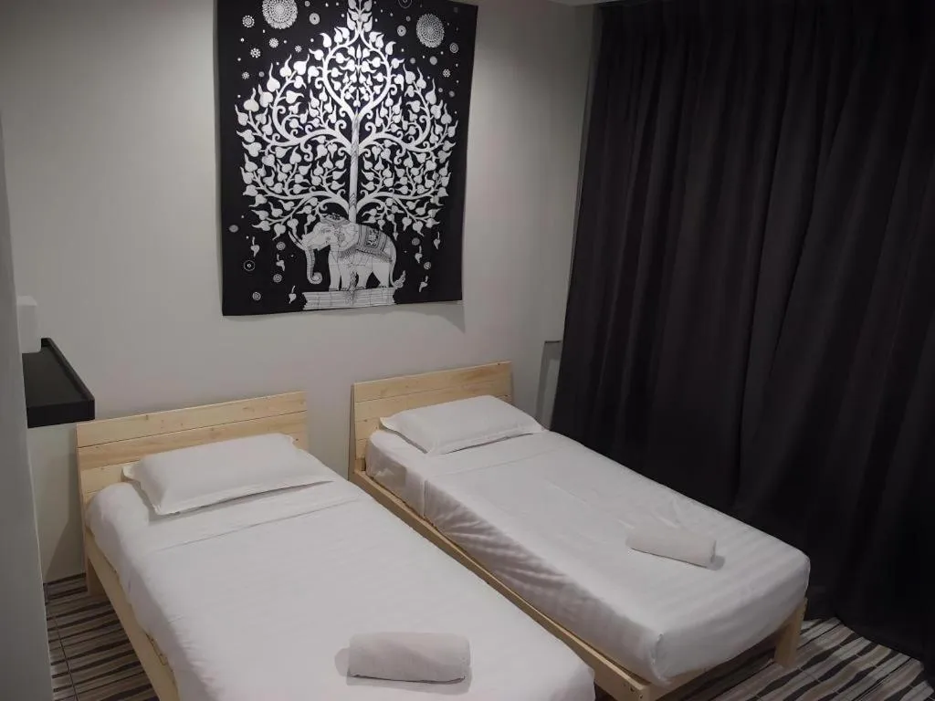 Bed in De Chukai Hotel