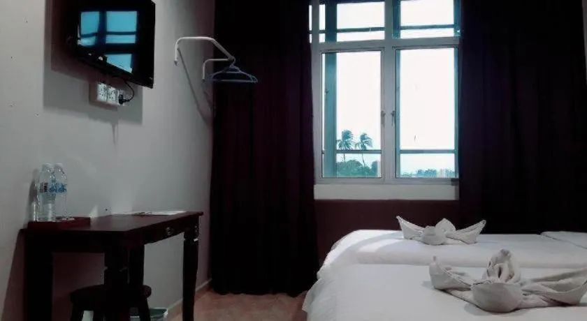 Bed in De Chukai Hotel