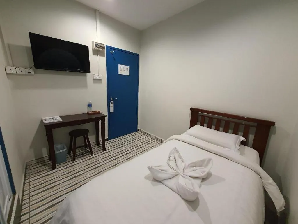 Bed in De Chukai Hotel