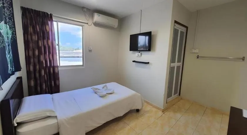 Bed in De Chukai Hotel