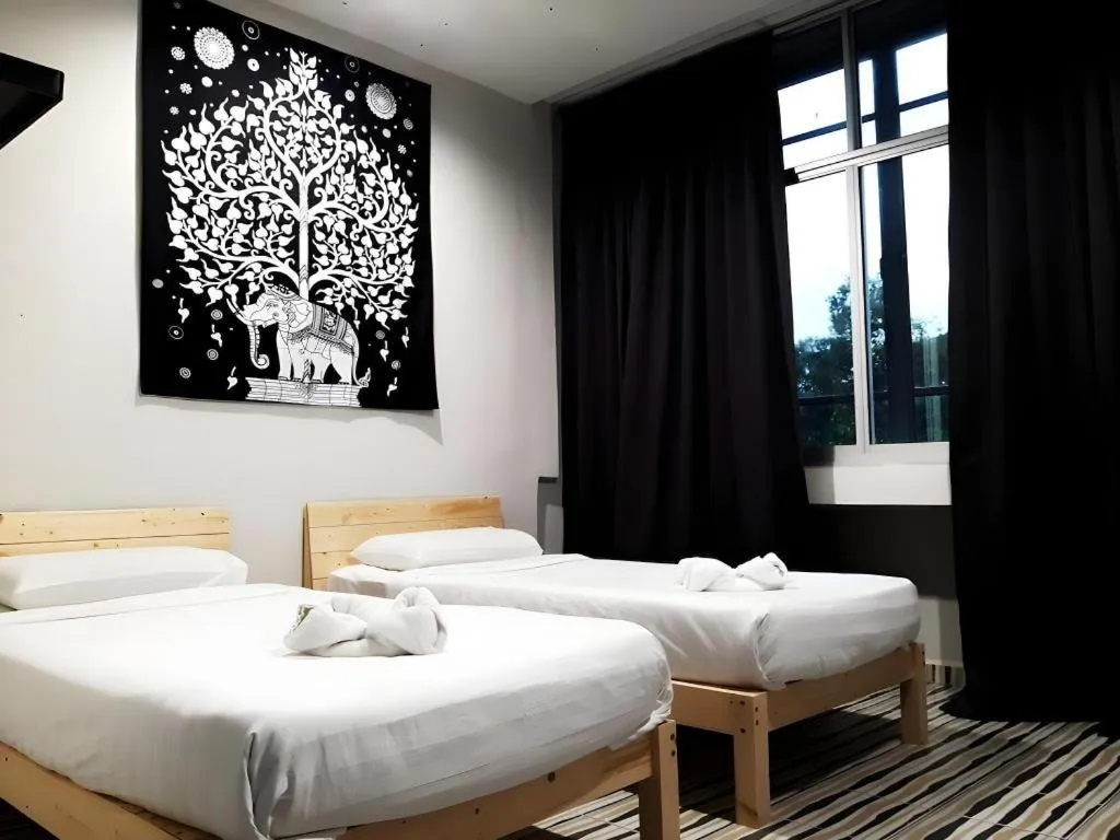 Bed in De Chukai Hotel