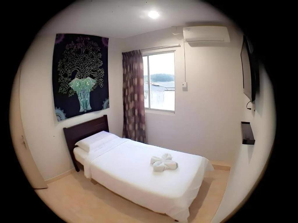 Bed in De Chukai Hotel