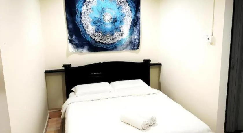 Bed in De Chukai Hotel