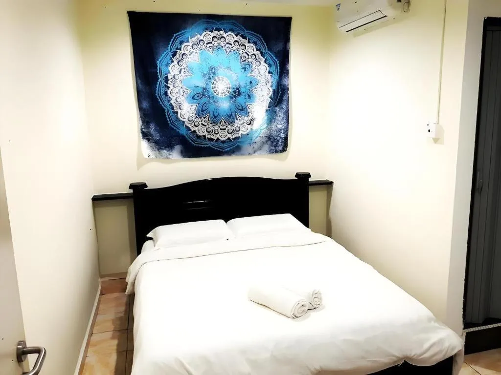 Bed in De Chukai Hotel