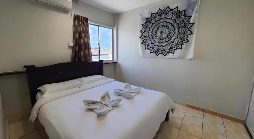 Bed in De Chukai Hotel