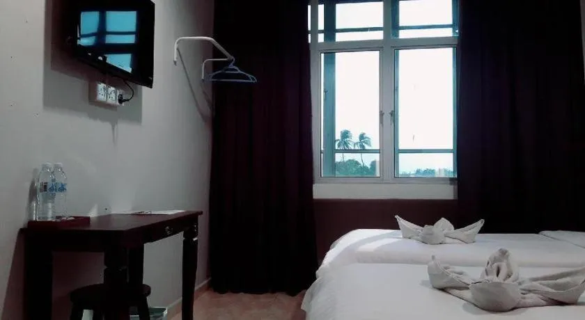 Bed in De Chukai Hotel