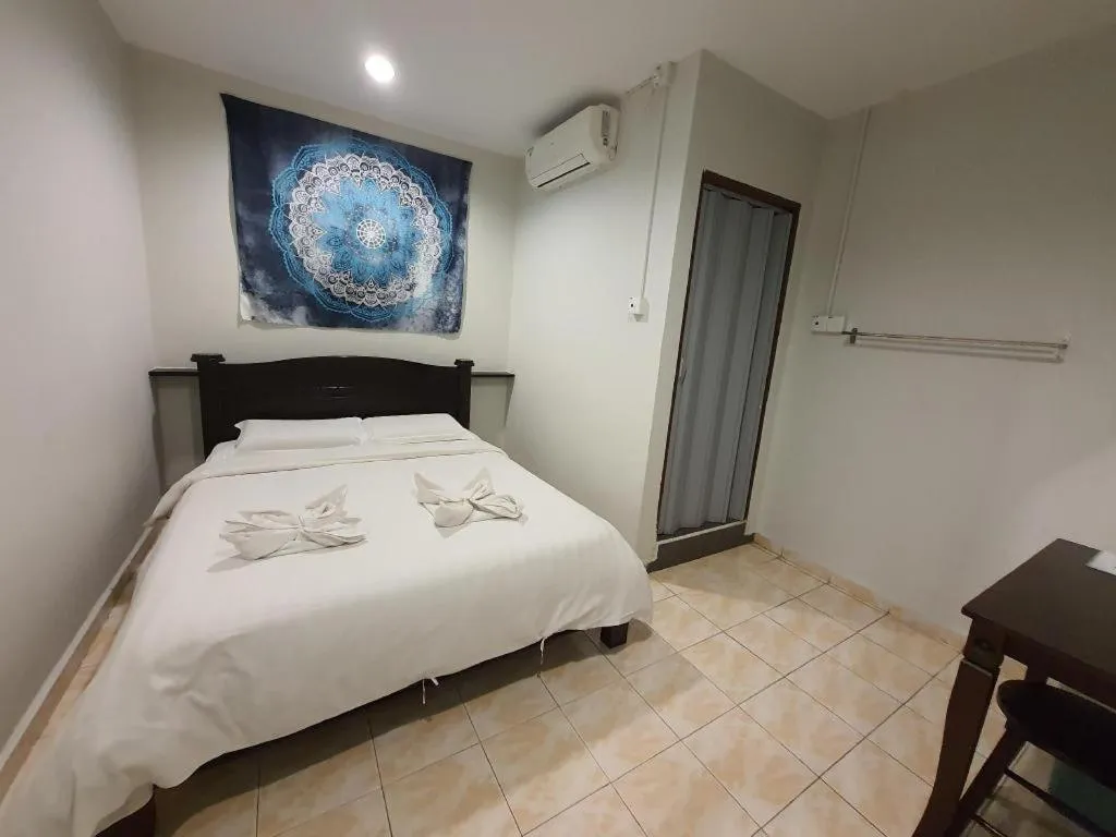 Bed in De Chukai Hotel