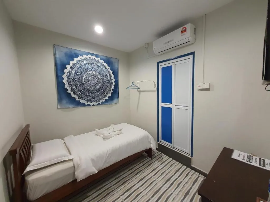 Bed in De Chukai Hotel