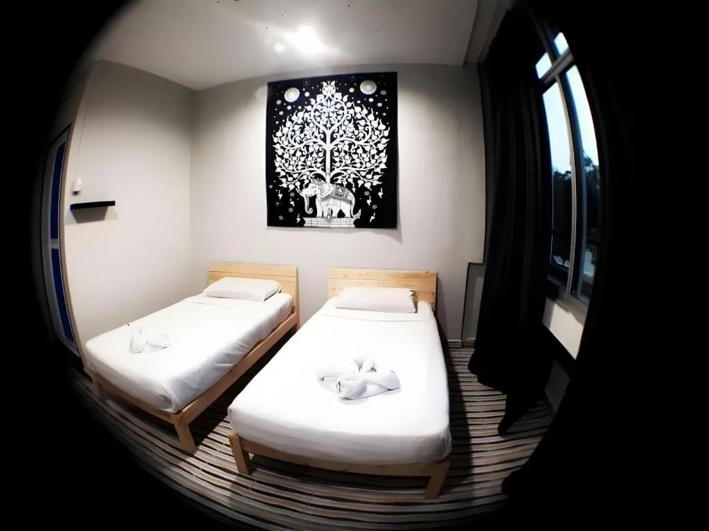 Bed in De Chukai Hotel