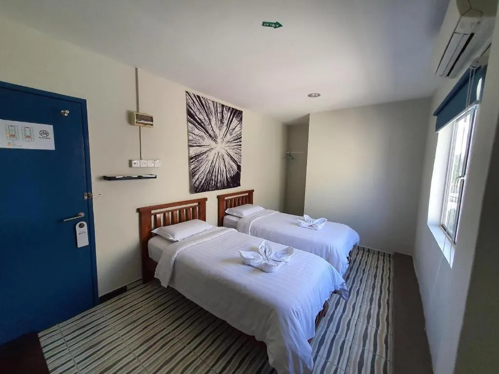 Bed in De Chukai Hotel