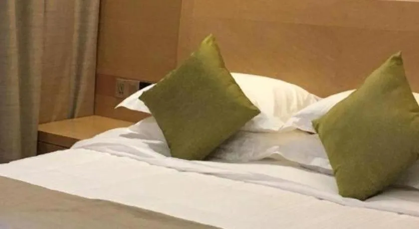 Bed in GreenTree Inn Huainan Shou County Zijin Road Express Hotel