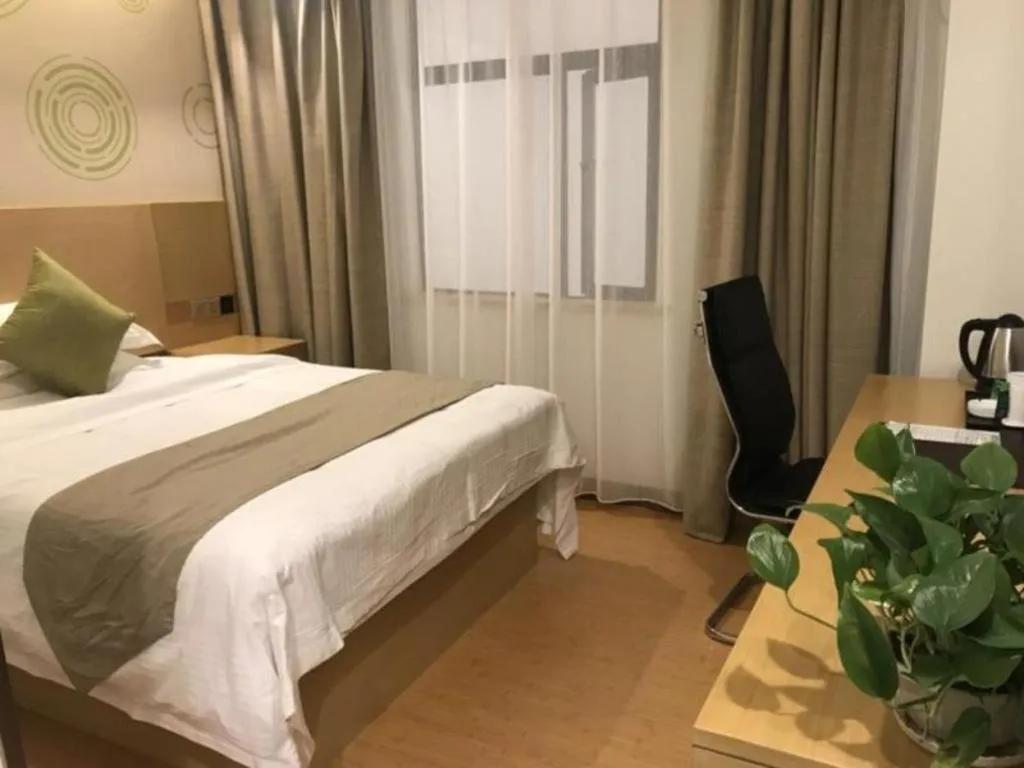 Bed in GreenTree Inn Huainan Shou County Zijin Road Express Hotel