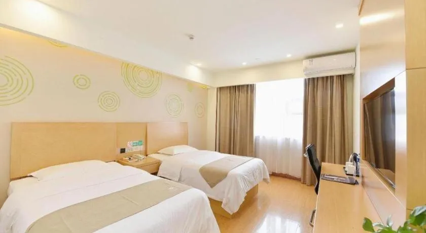 Bed in GreenTree Inn Huainan Shou County Zijin Road Express Hotel