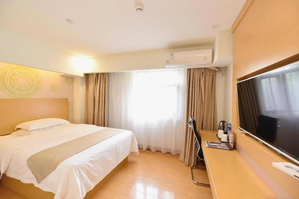 Bed in GreenTree Inn Huainan Shou County Zijin Road Express Hotel
