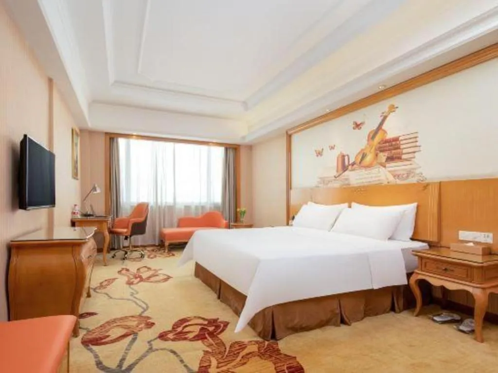 Bed in Vienna International Hotel Guangzhou Jichang Road Huangshi