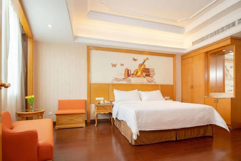 Bed in Vienna International Hotel Guangzhou Jichang Road Huangshi