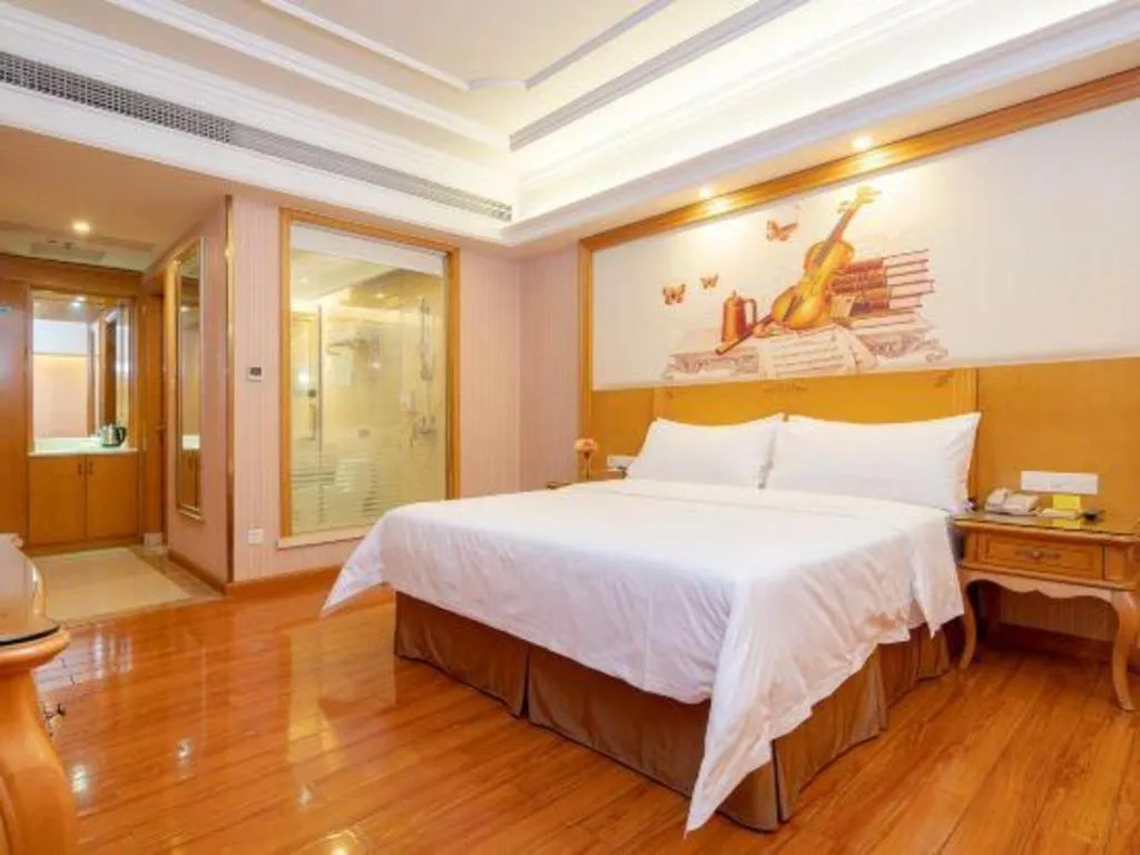 Bed in Vienna International Hotel Guangzhou Jichang Road Huangshi