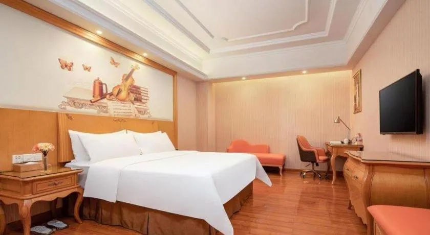 Bed in Vienna International Hotel Guangzhou Jichang Road Huangshi