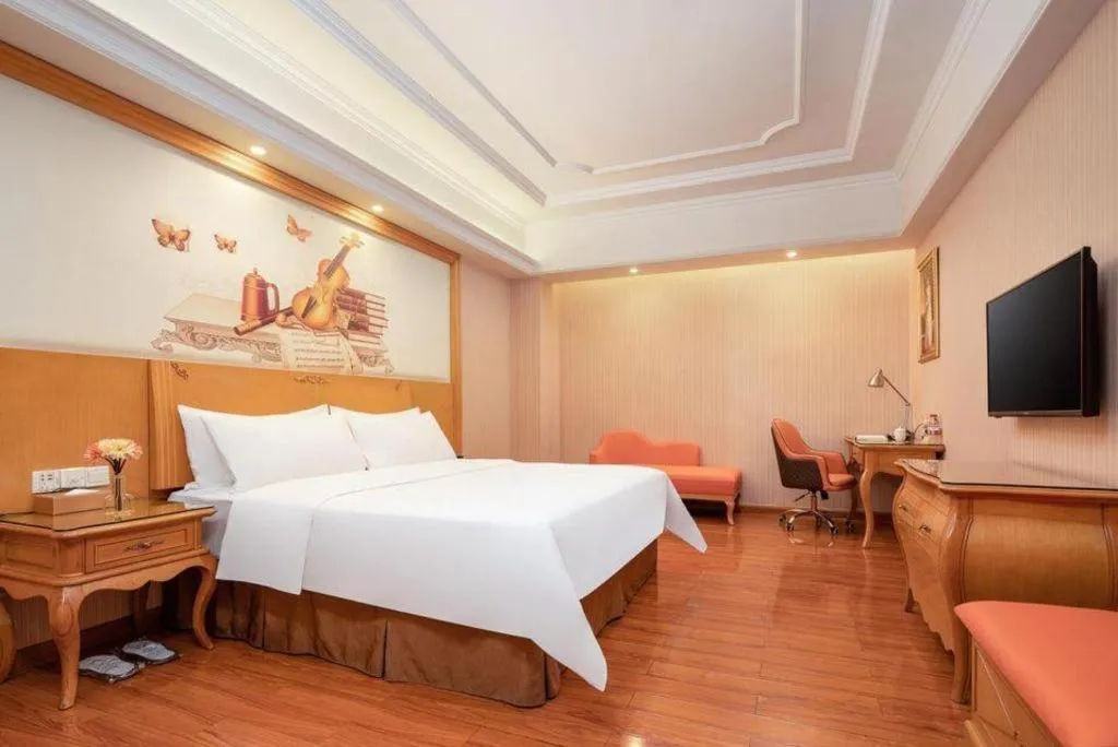 Bed in Vienna International Hotel Guangzhou Jichang Road Huangshi