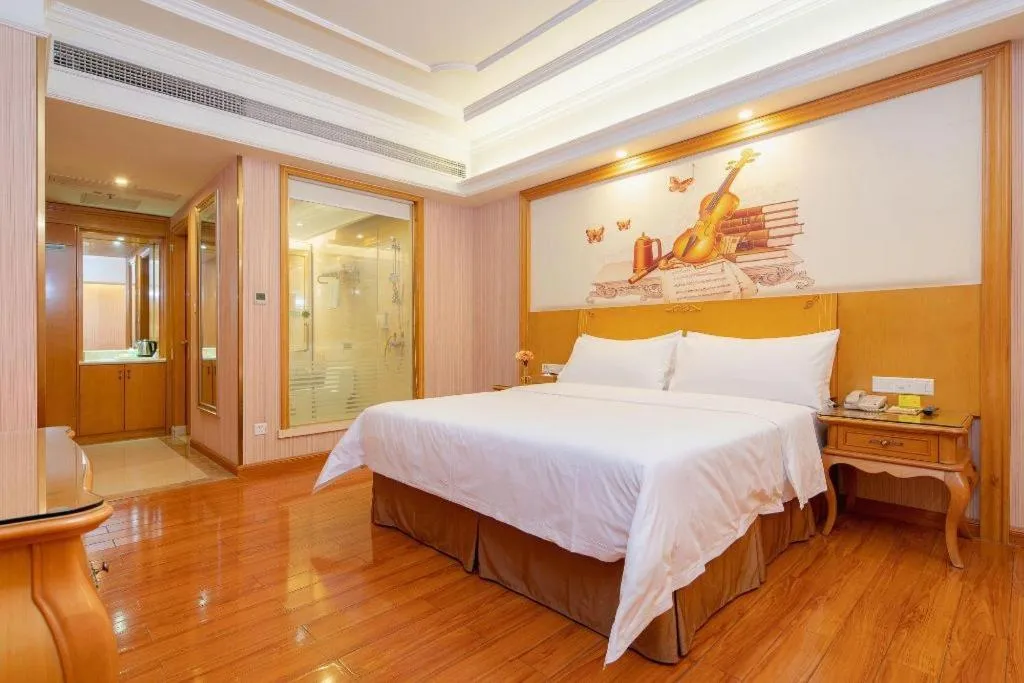 Bed in Vienna International Hotel Guangzhou Jichang Road Huangshi