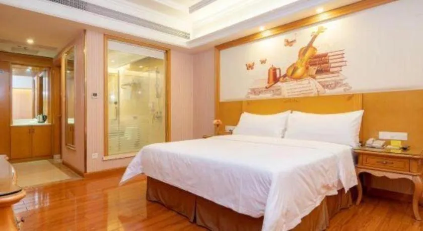 Bed in Vienna International Hotel Guangzhou Jichang Road Huangshi