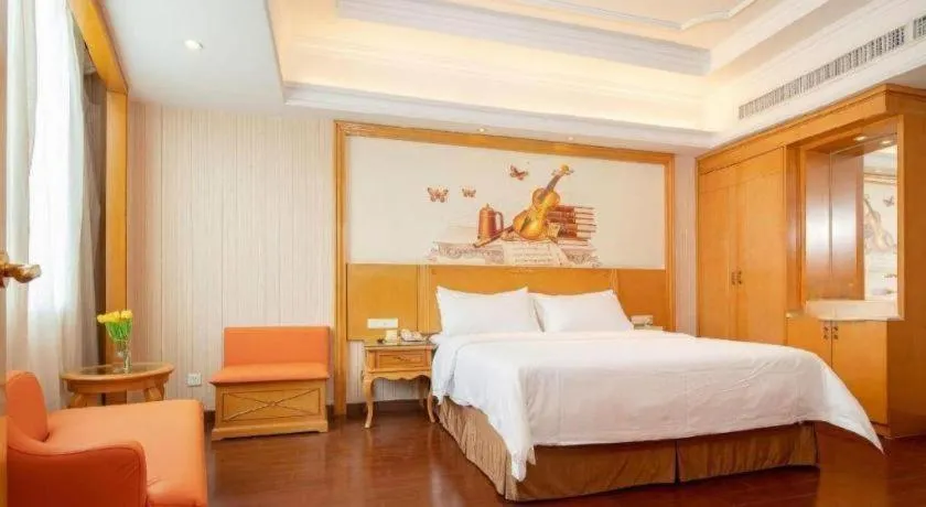 Bed in Vienna International Hotel Guangzhou Jichang Road Huangshi