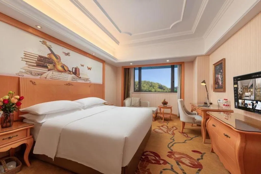 Bed in Vienna International Hotel Guangzhou Jichang Road Huangshi