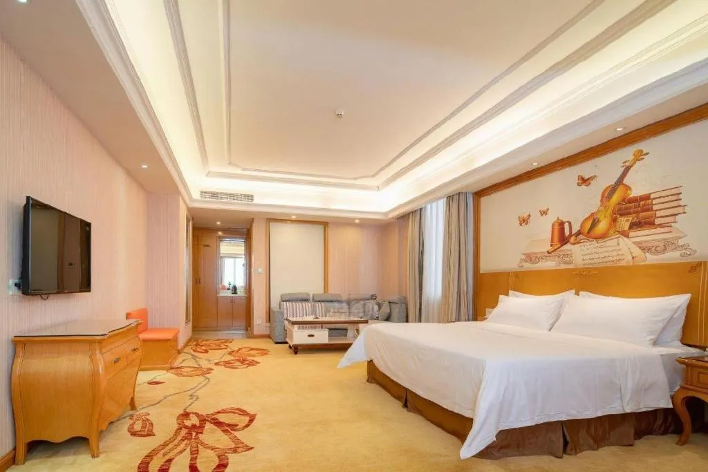 Bed in Vienna International Hotel Guangzhou Jichang Road Huangshi