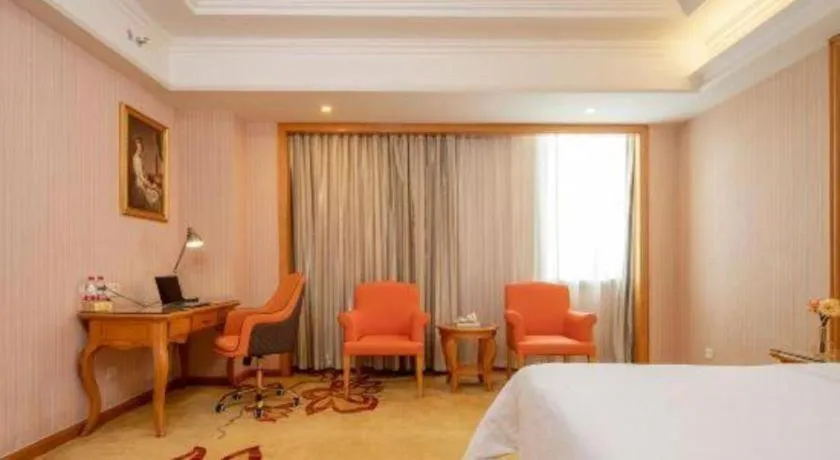 Bed in Vienna International Hotel Guangzhou Jichang Road Huangshi