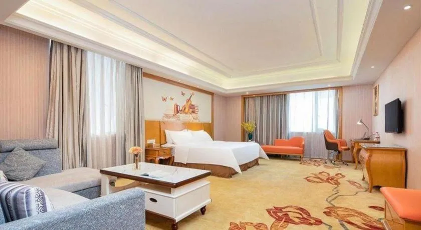 Bed in Vienna International Hotel Guangzhou Jichang Road Huangshi
