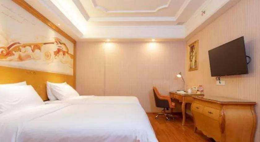Bed in Vienna International Hotel Guangzhou Jichang Road Huangshi