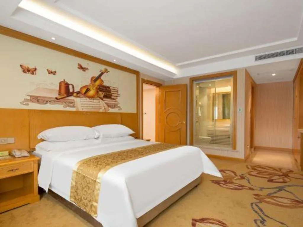Bed in Vienna International Hotel Guangzhou Jichang Road Huangshi