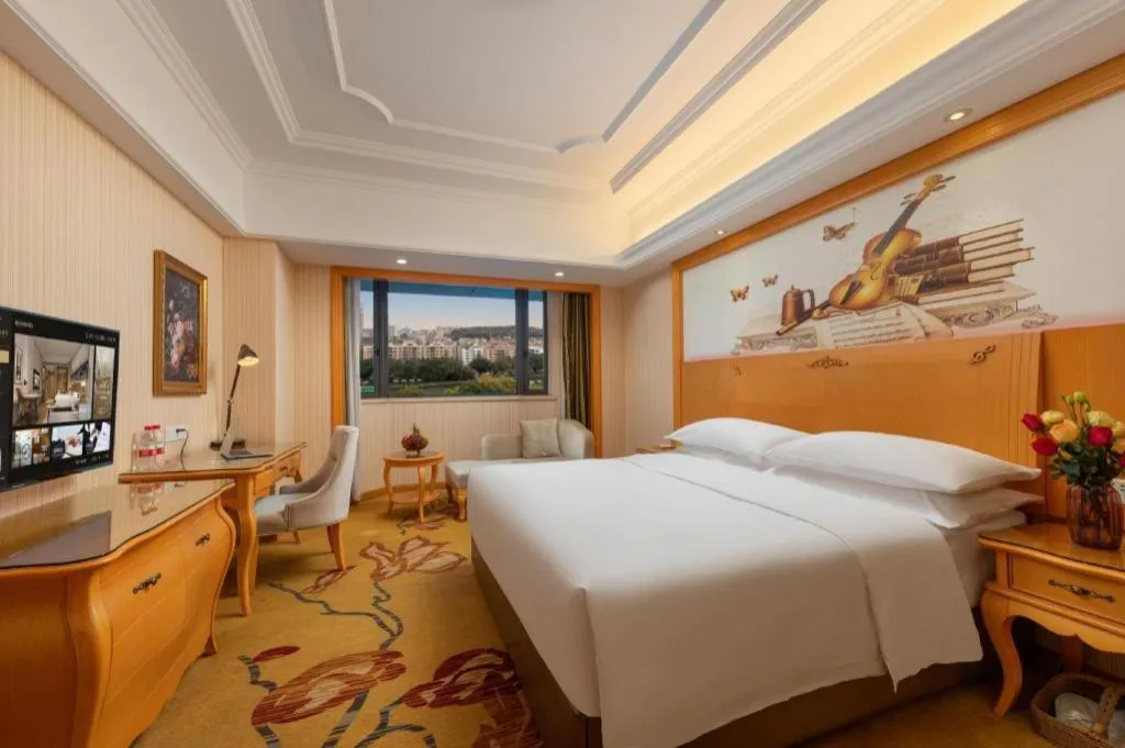 Bed in Vienna International Hotel Guangzhou Jichang Road Huangshi