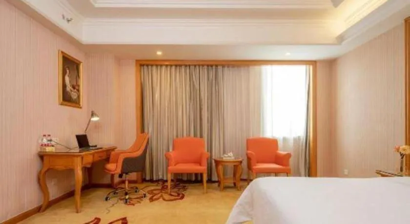 Bed in Vienna International Hotel Guangzhou Jichang Road Huangshi
