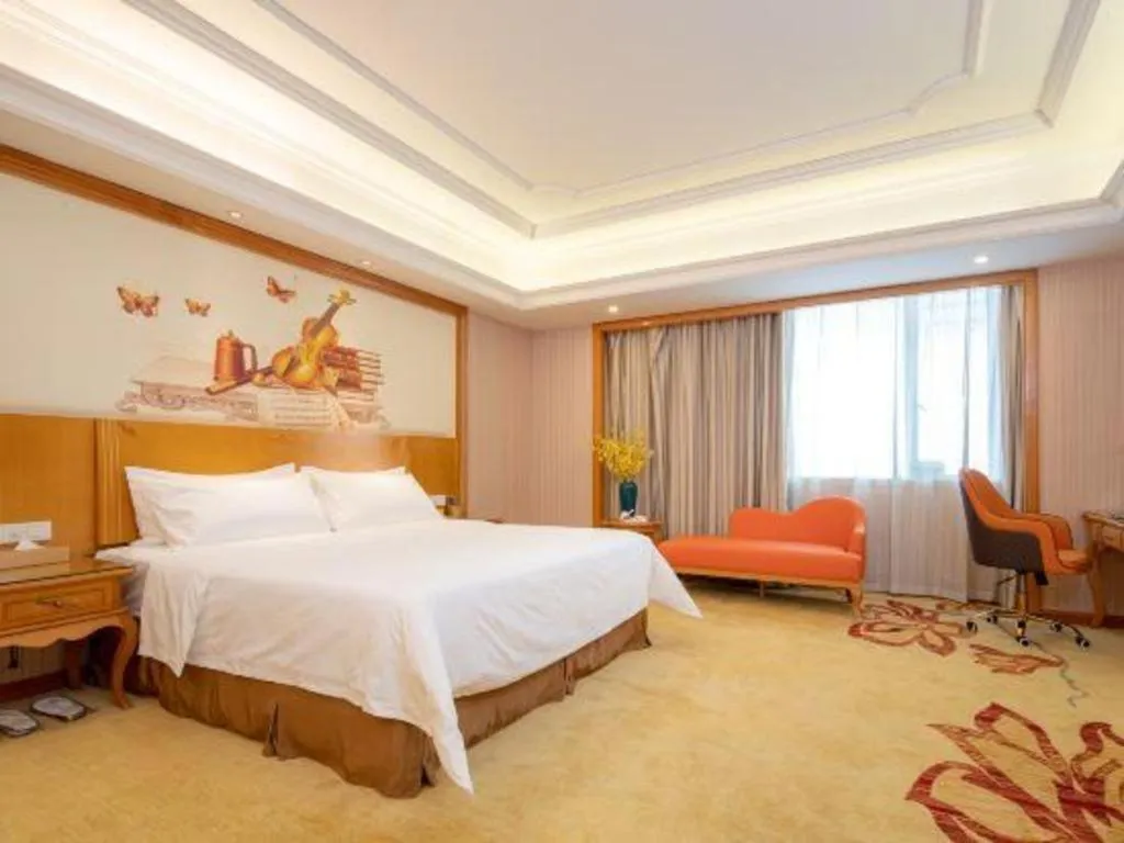 Bed in Vienna International Hotel Guangzhou Jichang Road Huangshi