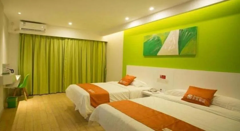 Bed in Shell Qionghai Jinhai Road Hotel