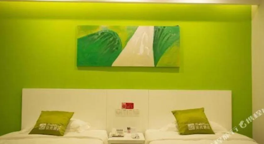 Bed in Shell Qionghai Jinhai Road Hotel