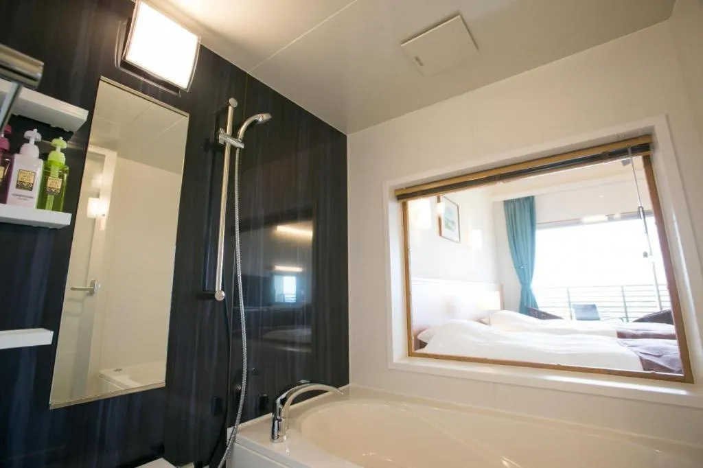 Bed in Sakura Resort Hotel Ishigaki