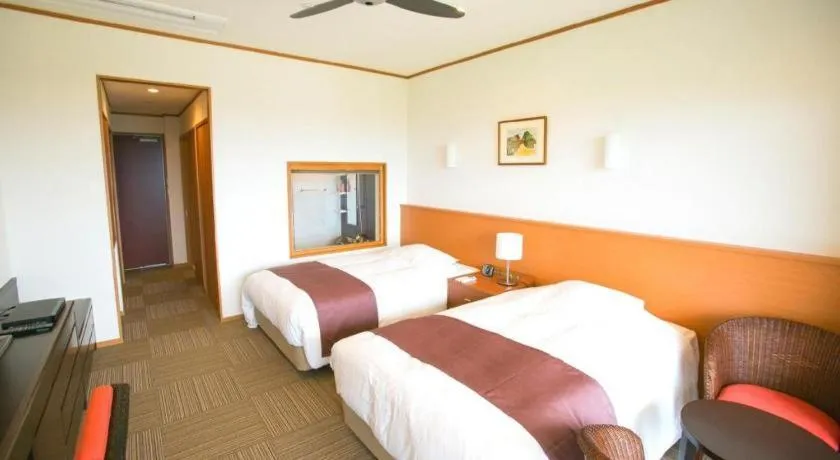 Bed in Sakura Resort Hotel Ishigaki