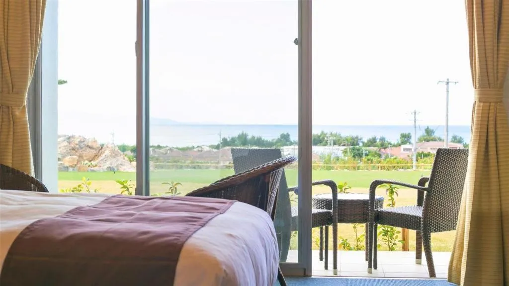 Bed in Sakura Resort Hotel Ishigaki