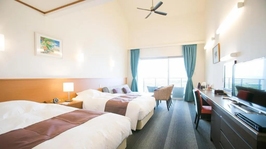 Bed in Sakura Resort Hotel Ishigaki