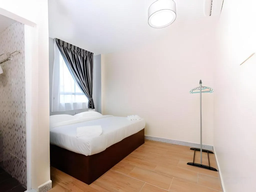 Bed in SemRock Hotel