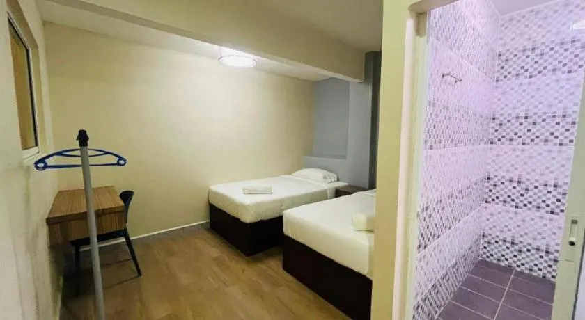 Bed in SemRock Hotel