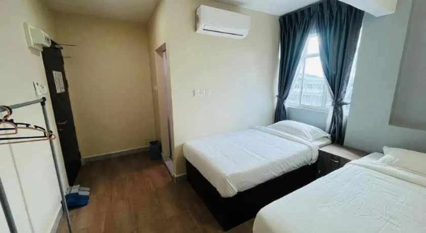 Bed in SemRock Hotel