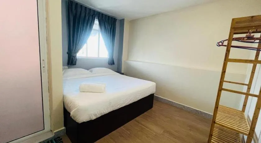 Bed in SemRock Hotel