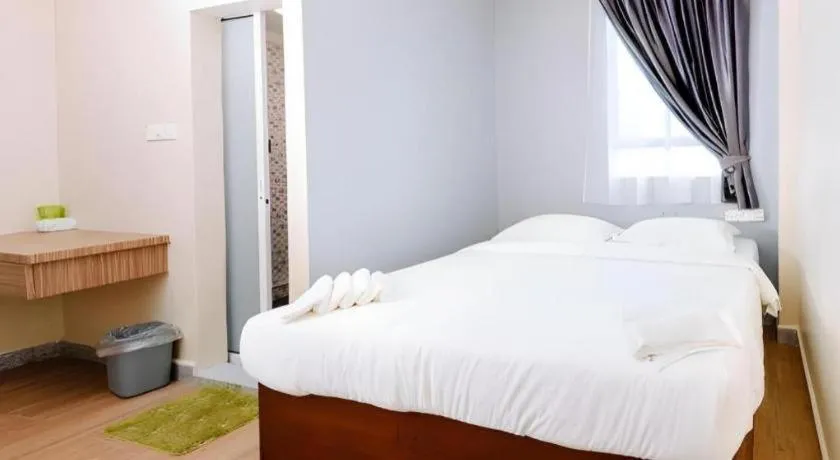 Bed in SemRock Hotel