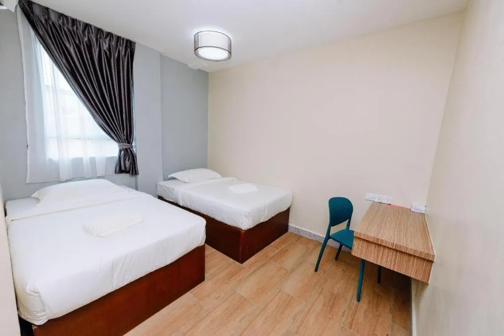 Bed in SemRock Hotel