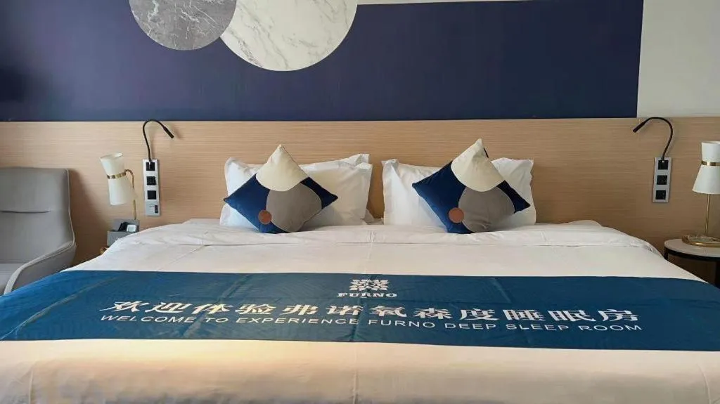 Bed in Imin Hotel