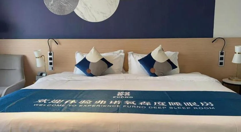 Bed in Imin Hotel