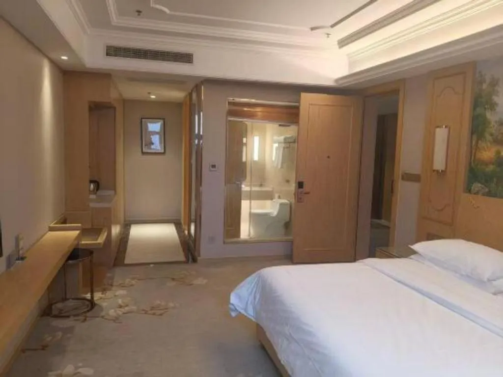 Bed in Vienna International Hotel Wuxi Taihu Expo Center